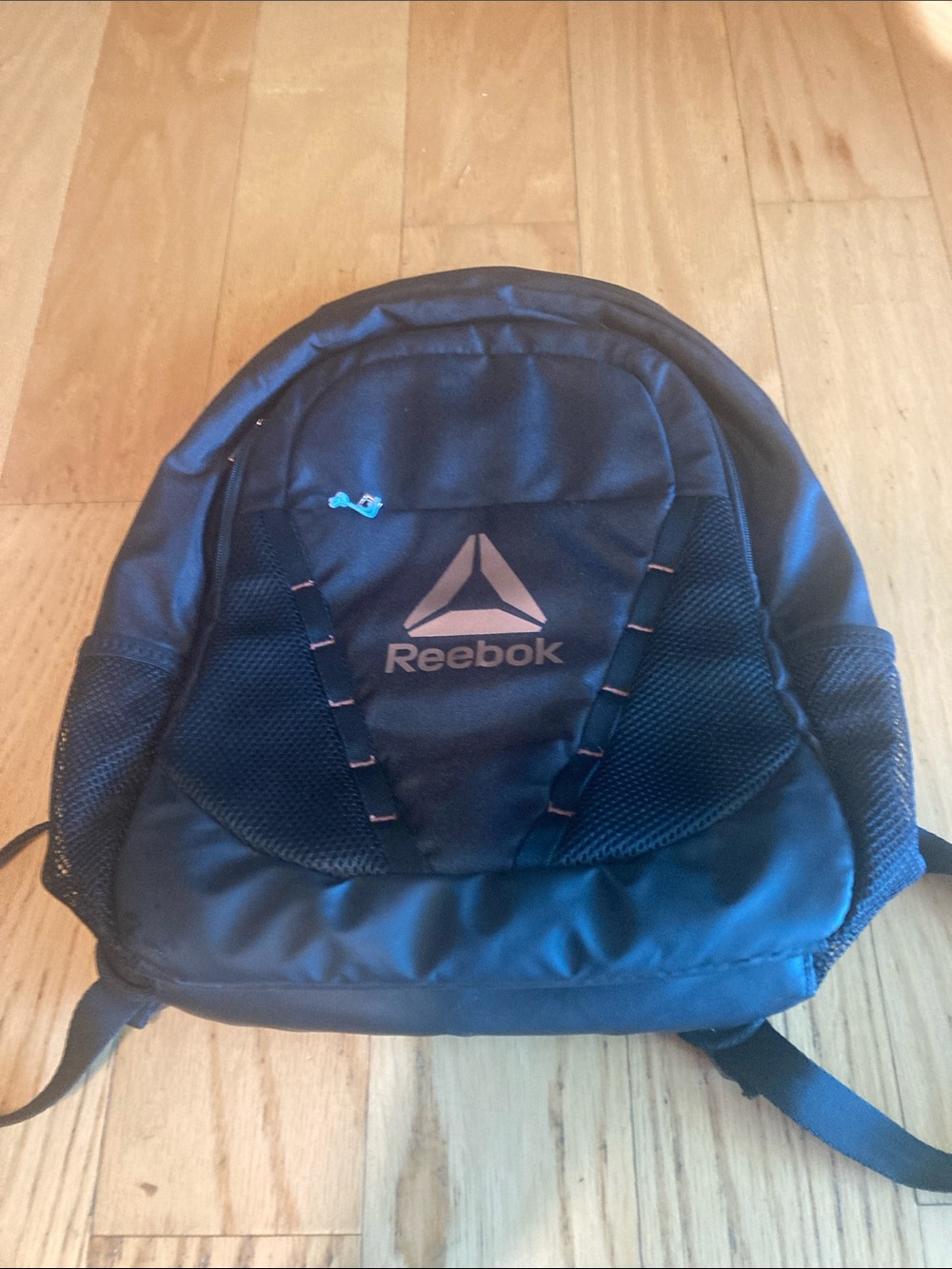 Reebok Black Backpack with Subtle Orange Accent unisex